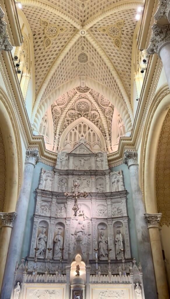 Intricate vaulted ceiling and altar inside a historic church in Erice, Sicily.